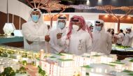H E Sheikh Hamad bin Jassim bin Jabor Al Thani tours the pavilions at Cityscape Qatar 2021, yesterday. 