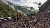 Members of National Disaster Response Force (NDRF) evacuate stranded people following heavy rains at Chhara village in Nainital district, in the northern state of Uttarakhand, India, October 20, 2021. National Disaster Response Force/Handout via REUTERS