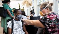 FILE PHOTO: A child gets his second dose of the coronavirus disease (COVID-19) vaccine at the Philadelphia Zoo in Philadelphia, Pennsylvania, U.S., September 7, 2021. REUTERS/Rachel Wisniewski