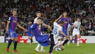  FC Barcelona's Gerard Pique scores their first goal REUTERS/Albert Gea
