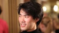 Bruce Xiaoyu Liu of Canada reacts after he was announced the winner of the 18th International Fryderyk Chopin Piano Competition in Warsaw, Poland October 21, 2021. Maciej Jazwiecki/Agencja Gazeta via Reuters