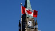 A Canadian flag flies in front of the Peace Tower on Parliament Hill in Ottawa, Ontario, Canada, March 22, 2017. REUTERS/Chris Wattie/File Photo
