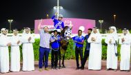 The connection of Taxiwala celebrate after winning the Sealine Cup at Al Rayyan Racecourse  yesterday.