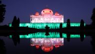 Humayun's Tomb is lit in tricolour as India celebrates the milestone of administering one billion COVID-19 vaccine doses, in New Delhi, India, October 21, 2021. REUTERS/Anushree Fadnavis
