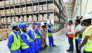 The employees of Mekdam Holding Group in its manufacturing unit.