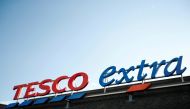 A logo of Tesco is pictured outside a Tesco supermarket in Hatfield, Britain October 6, 2020. REUTERS/Peter Cziborra/File Photo