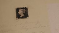 World's first postage stamp, a Penny Black, is seen on display ahead of auction at Sotheby's in London, Britain, October 19, 2021. Reuters/Hannah McKay