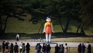 A giant doll named 'Younghee' from Netflix series 'Squid Game' is on display at a park in Seoul, South Korea, October 26, 2021. REUTERS/Kim Hong-Ji