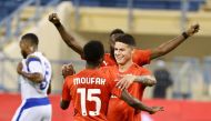 James Rodriguez celebrates with team-mates after scoring his first goal for Al Rayyan yesterday.