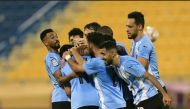 Al Wakrah players celebrate after Abdulghanai Muneer scored against Al Gharafa yesterday.