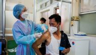 A man receives the AstraZeneca coronavirus disease (COVID-19) vaccine as a booster dose at the National Pediatric Hospital in Phnom Penh, Cambodia, August 12, 2021. REUTERS/Cindy Liu/File Photo