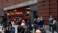 :FILE PHOTO: New York City Fire Department (FDNY) Uniformed Firefighters Association (UFA) President Andrew Ansbro speaks while a NYFD truck exit the building during a news conference as the city's COVID-19 vaccine mandate deadline approaches at Ladder Co. 24 in Manhattan, New York City, New York, U.S., October 29, 2021. REUTERS/Eduardo Munoz/File Photo
