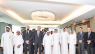 Chairman of QBA Sheikh Faisal bin Qassim Al Thani; Ambassador of the Federal Republic of Germany to Qatar H E Dr. Claudius Fischbach; members of QBA and members of the delegation of German companies posing for a photo.