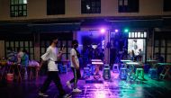 People walk on Khaosan Road as tourist are allowed to visit the country for the first time in 18 months after coronavirus disease (COVID-19) restrictions were eased, in Bangkok, Thailand November 2, 2021. REUTERS/Soe Zeya Tun
