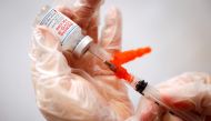 A healthcare worker prepares a syringe with the Moderna COVID-19 Vaccine at a pop-up vaccination site operated by SOMOS Community Care during the COVID-19 pandemic in Manhattan in New York City, New York, U.S., January 29, 2021. REUTERS/Mike Segar/File Photo