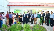 Ambassador of India to Qatar, Dr. Deepak Mittal, with other official during the event.