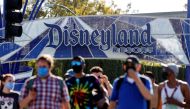 People leave the Disneyland Resort on Disneyland Park and Disney California Adventure's reopening day amidst the coronavirus disease (COVID-19) outbreak, in Anaheim, California, U.S., April 30, 2021. REUTERS/Mario Anzuoni/File Photo 