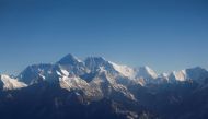 Mount Everest, the world highest peak, and other peaks of the Himalayan range are seen through an aircraft window during a mountain flight from Kathmandu, Nepal January 15, 2020. REUTERS/Monika Deupala/File Photo