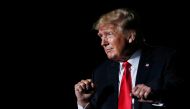Former U.S. President Donald Trump reacts after his speech during a rally at the Iowa States Fairgrounds in Des Moines, Iowa, U.S., October 9, 2021. Reuters/Rachel Mummey/File Photo