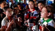 Rappler reporter Pia Ranada interviews Davao City Mayor Sara Duterte, the eldest daughter of President Rodrigo Duterte, after a campaign sortie in Calamba City, Laguna, Philippines, March 9, 2019. REUTERS/Eloisa Lopez/File Photo