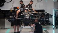  Mechanics working on Mercedes' Valtteri Bottas car REUTERS/Ricardo Moraes