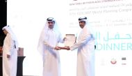 An official from Barwa Real Estate Group receives a memento to honour the Company for its Platinum Sponsorship of the recently concluded 57th ISOCARP's Congress in Doha. 
