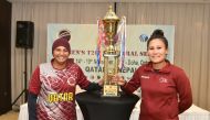Qatar and Nepal captains pose with the trophy after the unveiling ceremony on Monday. Pics: Abdul Basit 