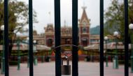 A locked gate is seen after the Hong Kong Disneyland theme park has been closed, following the coronavirus outbreak in Hong Kong, China January 26, 2020. REUTERS/Tyrone Siu/File Photo

