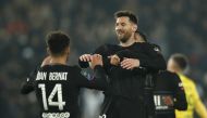 Paris St Germain's Juan Bernat and Lionel Messi celebrate scoring their second goal REUTERS/Benoit Tessier