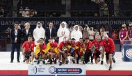 President of the Qatar Tennis Squash and Badminton Federation (QTSBF) Nasser Al Khelaifi, QTSBF Secretary-General Tariq Zainal and other officials pose for a picture with Spain's men team
