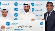 Winner of the 4th edition of Misk Account annual draw with QIB officials.