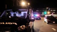 Emergency personnel respond to the scene after a car plowed through a holiday parade in Waukesha, Wisconsin, U.S., November 21, 2021. REUTERS/Daniel Steinle
