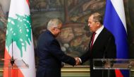:Russian Foreign Minister Sergey Lavrov shakes hands with his Lebanese counterpart Abdallah Bou Habib at a joint news conference in Moscow, Russia, November 22, 2021. REUTERS/Evgenia Novozhenina/Pool