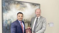 GWC Group CEO Ranjeev Menon with Bridgestone CEO Michael Codron.