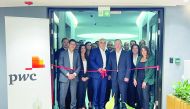 Bassam Hajhamad, Qatar Country Senior Partner at PwC Middle East, with other PwC consultants and experts, at the newly expanded office, recently. 