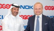 Aziz Aluthman Fakhroo, Managing Director, Ooredoo Group; and Pekka Lundmark, President and Chief Executive Officer at Nokia, at the agreement signing event.