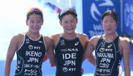Japan’s Juri Ide (centre) is seen with countrywomen Minori Ikeno (left) and Chisato Nakajima after winning the Elite Race of the QNB Asia Triathlon Cup Doha at the Lusail Marina.
