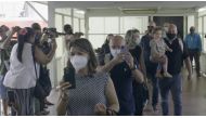 Travellers walk in the terminal upon arrival at Nadi Airport, Fiji in this still frame obtained from handout video dated December 1, 2021. FIJI AIRWAYS /Handout via REUTERS