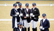 The podium winners of the second round of Longines Hathab Qatar Equestrian Tour Dressage.