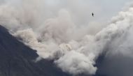 Ashes and clouds spew from Mount Semeru volcano as seen from Pronojiwo, Lumajang, East Java province, Indonesia December 6, 2021, in this photo taken by Antara Foto/Ari Bowo Sucipto/via REUTERS