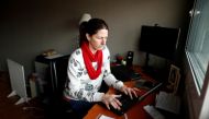 Barbara Temperley, 42, works from her home office, in Buenos Aires, Argentina September 6, 2021. REUTERS/Agustin Marcarian/File Photo