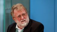 FILE PHOTO: Chairman of the Standing Vaccination Commission (STIKO) Thomas Mertens addresses a press conference on the situation of flu vaccines and the coronavirus disease (COVID-19) pandemic, in Berlin, Germany October 6, 2021. Odd Andersen/Pool via REUTERS/File Photo
