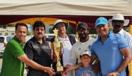 Qatar Cricket Association’s Domestic Cricket Head Gul Khan Jadoon presents the winner’s trophy to QIECO who won the Qatar Airways T20 Division C final at the West Bay Grounds.