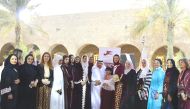 Qatari Businessmen Association’s (QBA) Chairman Sheikh Faisal bin Qassim Al Thani, Qatari Businesswomen Association (QBWA) Vice-President Aisha Al Fardan, and other QBWA members and guests, during the function. 