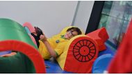 Young fans enjoy the sensory viewing room at Education City Stadium during the FIFA Arab Cup.