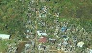 Aerial view showing damaged houses in Surigao City, Surigao Del Norte Province, Philippines, December 17, 2021. Picture taken December 17, 2021. Philippine Coast Guard/Handout via REUTERS. 