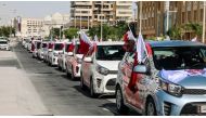A rally of cars by Hot N Cool Group marking Qatar National Day.