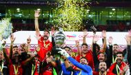 Al Ahly players celebrate after winning the penalty shootout to clinch their eighth TotalEnergies CAF Super Cup title at the Ahmed bin Ali Stadium in Umm Al Afaei, yesterday. 
