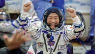 Japanese entrepreneur Yusaku Maezawa reacts as he speaks with his family after donning space suits shortly before the launch to the International Space Station (ISS) at the Baikonur Cosmodrome, Kazakhstan, December 8, 2021. REUTERS/Shamil Zhumatov/File Photo