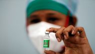 FILE PHOTO: A nurse displays a vial of Covishield, the AstraZeneca COVID-19 vaccine manufactured by Serum Institute of India, at a medical centre in Mumbai, India, January 16, 2021. REUTERS/Francis Mascarenhas/File Photo
